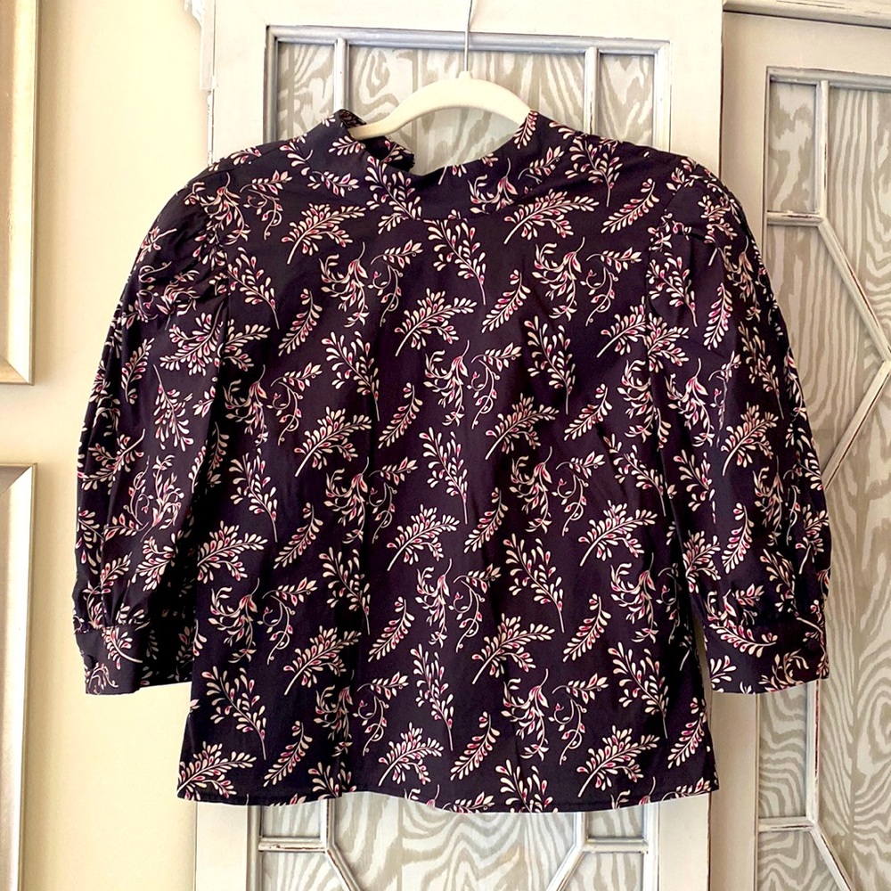 Floral on black puff sleeved blouse
